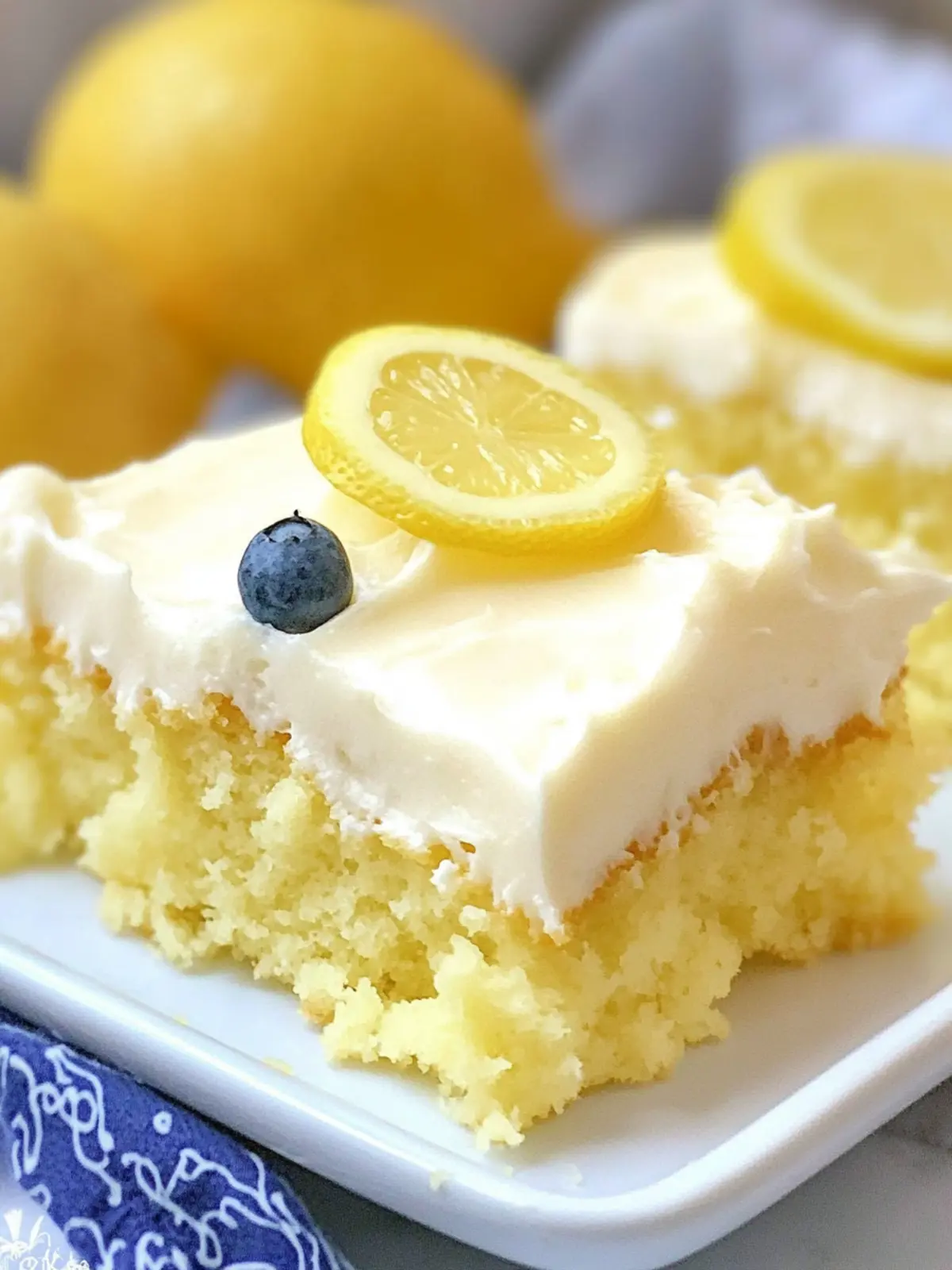 Zesty Lemon Sheet Cake with Cream Cheese Frosting Magic 2 Lemon Sheet Cake with Cream Cheese Frosting
